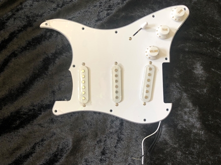 New Stratocaster guitar pick up plate, harness with pick ups, 5 way switch, pots etc,. 