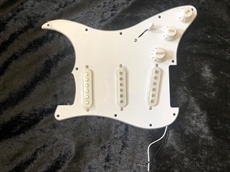 New Stratocaster guitar loaded scratchplate, harness with pick ups, 5 way switch, pots etc,. 